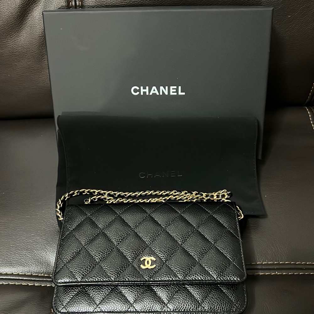X SOLD OUT X Chanel wallet on chain in black with gold hardware, cavier skin